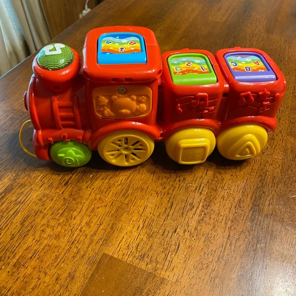 VTech roll and surprise animal train.